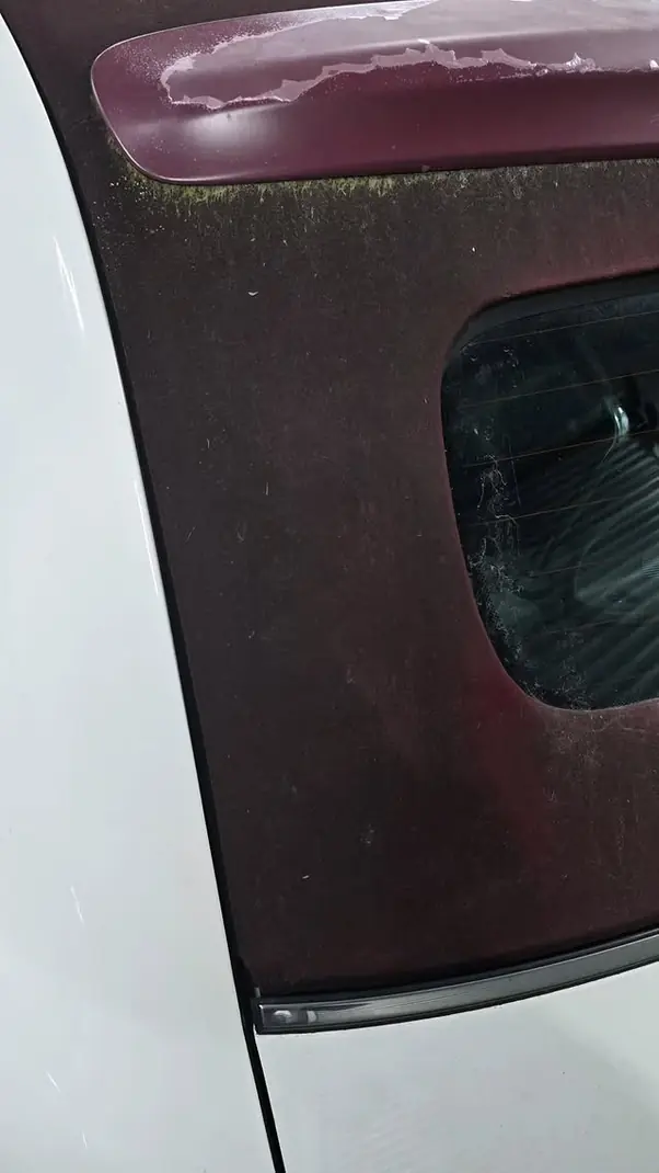 Cabrio-Verdeck vor der Aufbereitung, ausgeblichener Stoff mit Grünbelag – KFZ-Aufbereitung Siebers